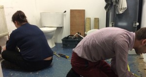 Charlotte and Martin working on their last day as they sing along to Christmas songs!