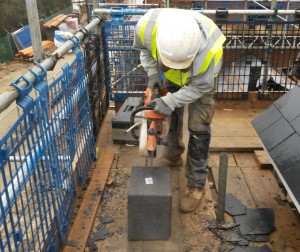 Martin cutting a block.