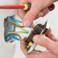 What is the standard day rate for a domestic electrician?