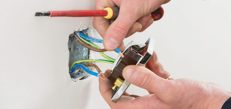 What is the standard day rate for a domestic electrician?