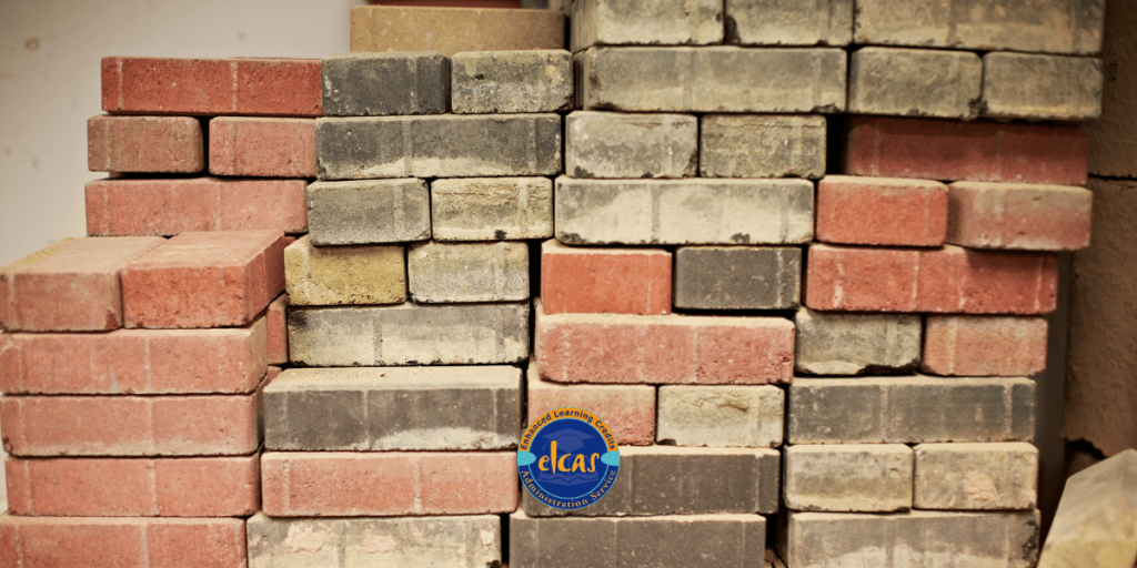 A stack of bricks and a small ELCAS logo