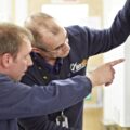 An Able Skills gas instructor is working with a trainee boiler installation engineer